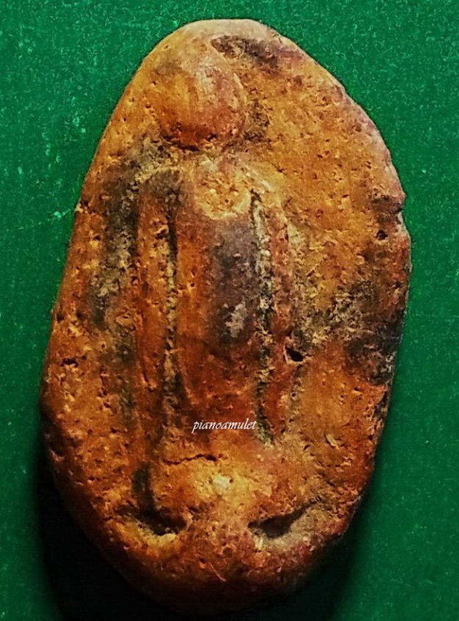 พระกำแพงเปิดโลก เม็ดทองหลาง